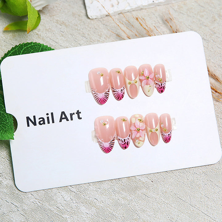 Artful artificial nails with delicate flower patterns Stornfield