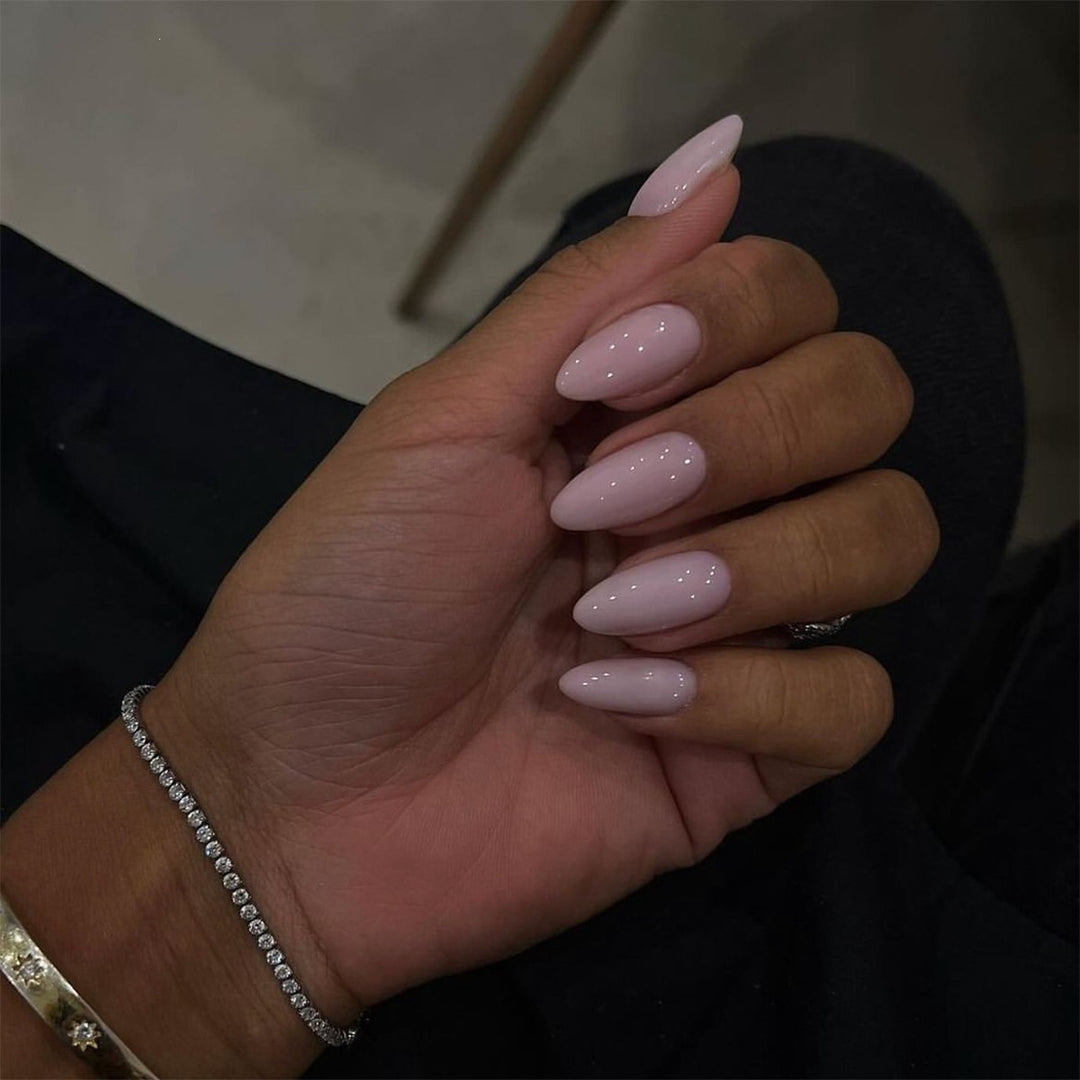 Acrylic nail set with luxurious color gradient and elegant lace accent Stornfield