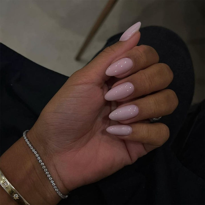Acrylic nail set with luxurious color gradient and elegant lace accent Stornfield