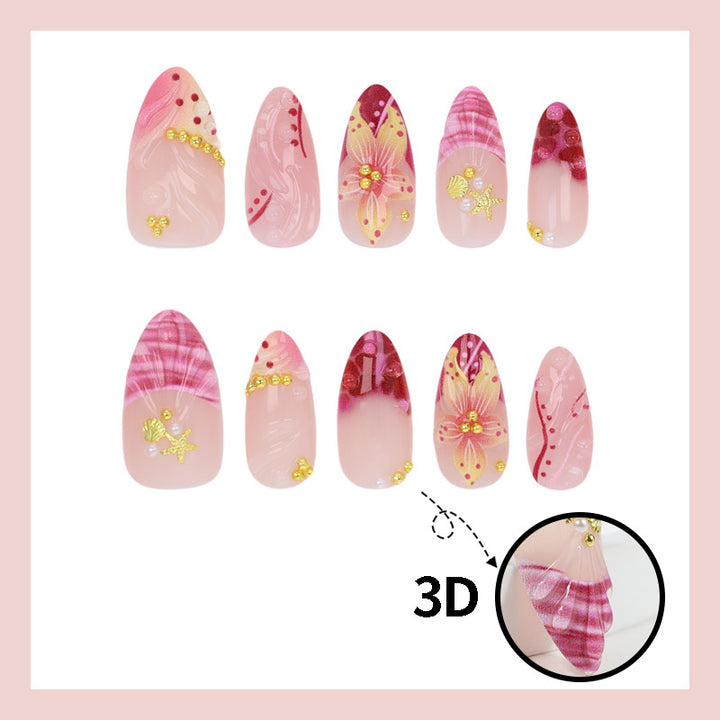 Fake nail set with floral patterns and luxurious embellishments Stornfield