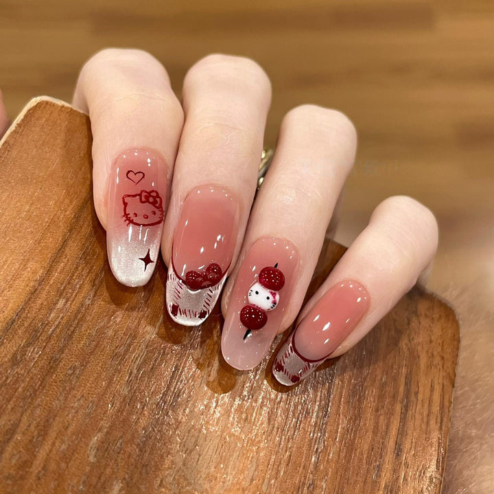 Artificial nails with playful Hello Kitty design Stornfield