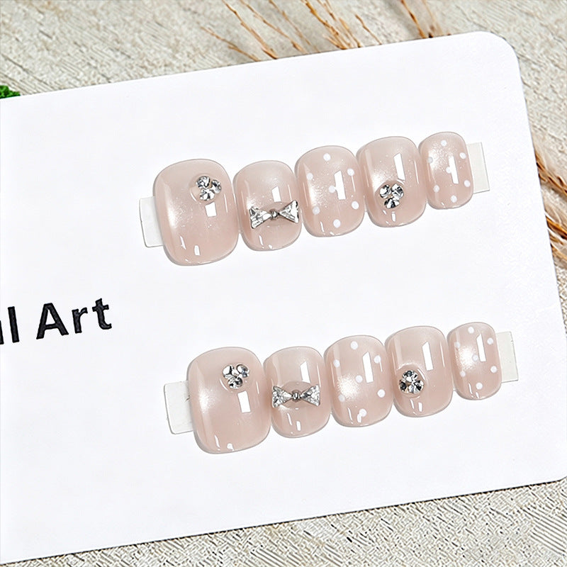 Artificial nail set with elegant glitter and crystal decorations Stornfield