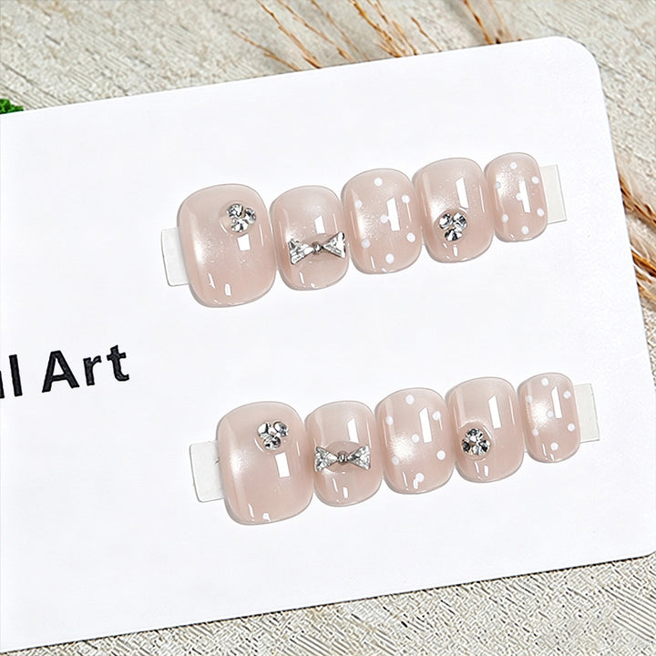 Artificial nail set with elegant glitter and crystal decorations Stornfield