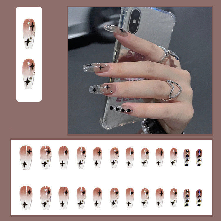Trendy artificial nails with star design Stornfield