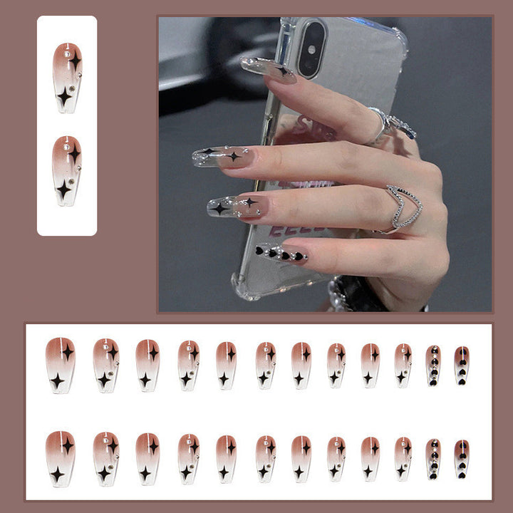 Trendy artificial nails with star design Stornfield