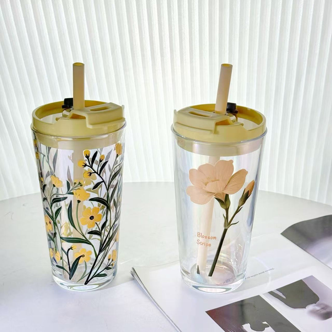 Women's drinking cup with practical silicone protective sleeve and decorative floral patterns Stornfield