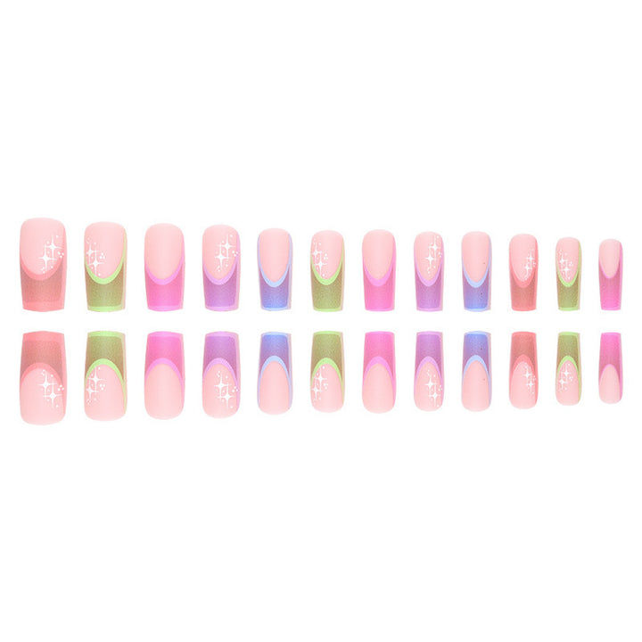 Acrylic nail set with colorful geometric designs and glitter accents Stornfield
