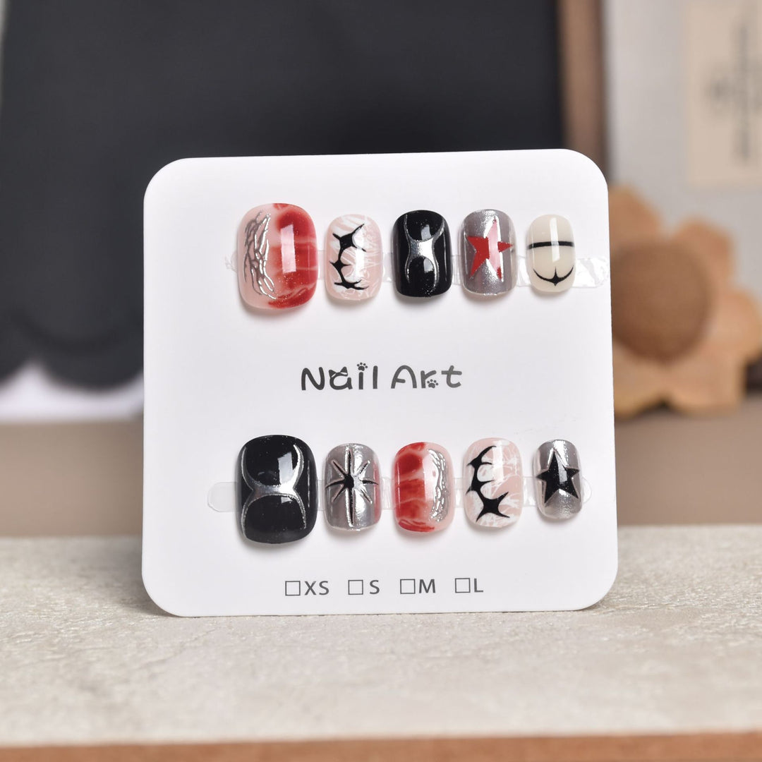 Artistic Star-Embellished Press-On Nail Set Stornfield