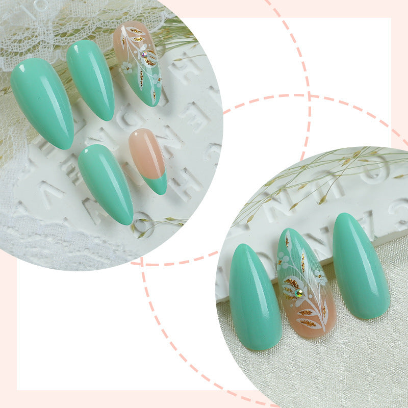 Artificial nail set with floral embellishments and elegant shape Stornfield