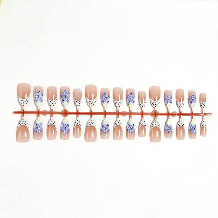 Artificial nails with delicate butterfly designs Stornfield