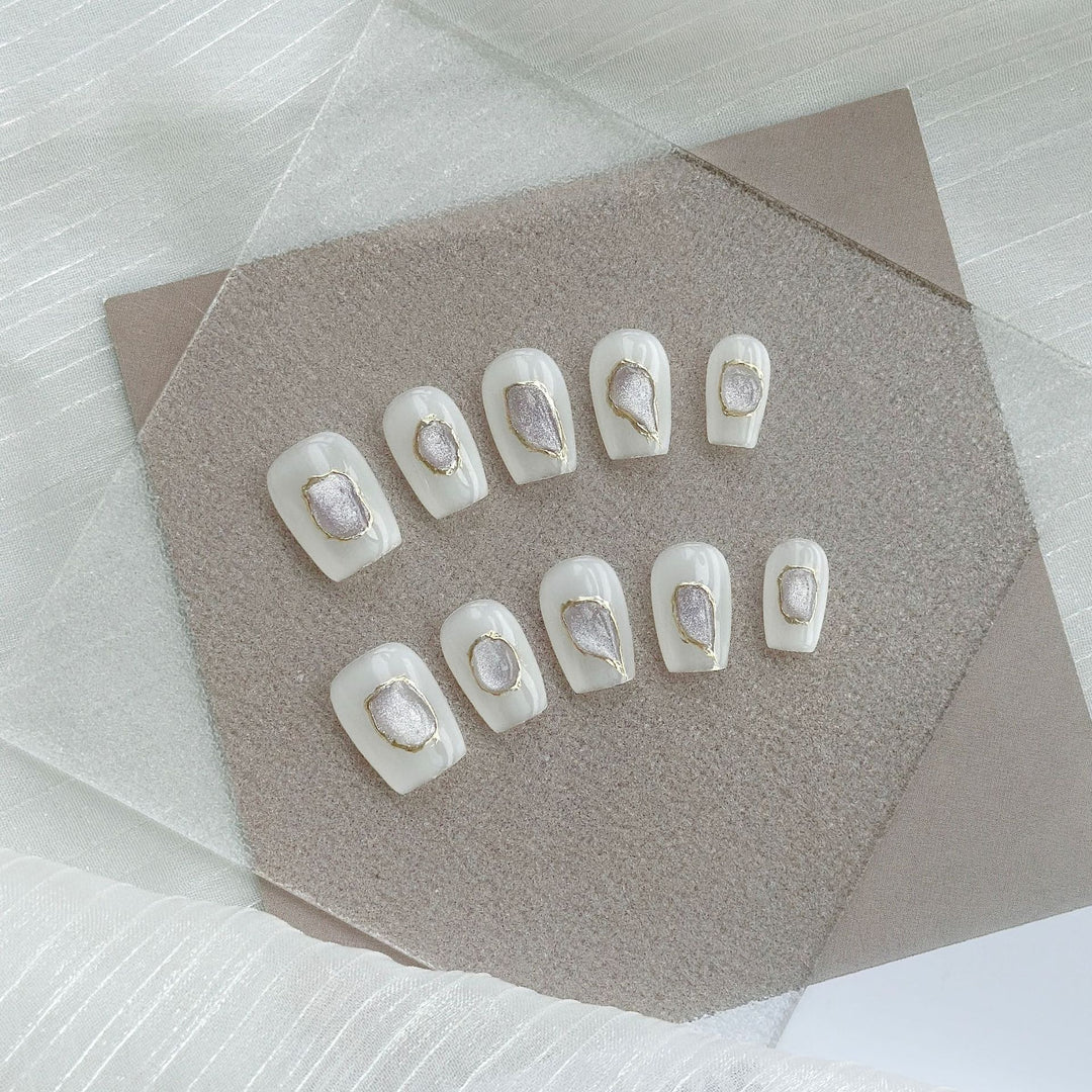 Artistic Press-On Nail Art Set with Heart and Celestial Designs