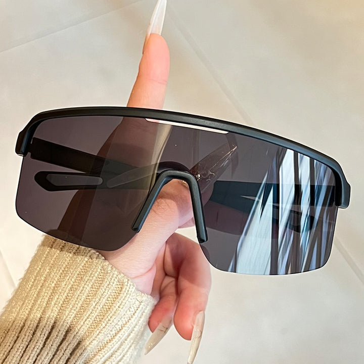 Unisex nan sporty shield sunglasses with continuous visor glass and non-slip nose pads Stornfield