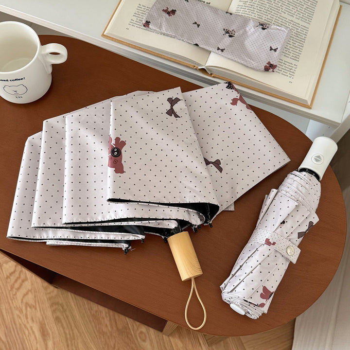Ladies collapsible umbrella with playful design Stornfield