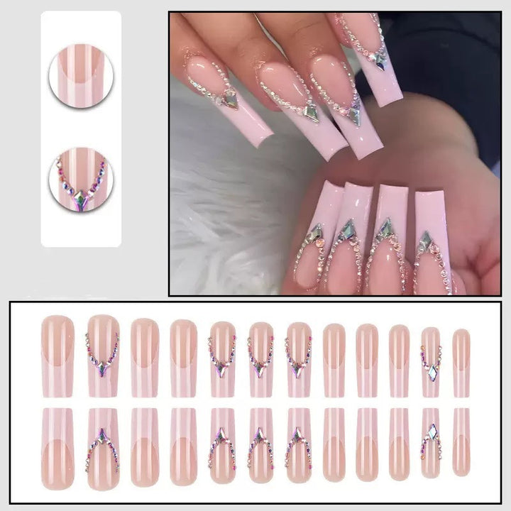 Glamorous artificial nails with sparkling rhinestone embellishments Stornfield
