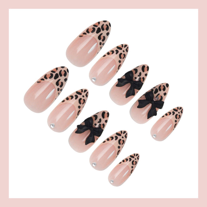 Animal-themed artificial nail set with elegant bows Stornfield
