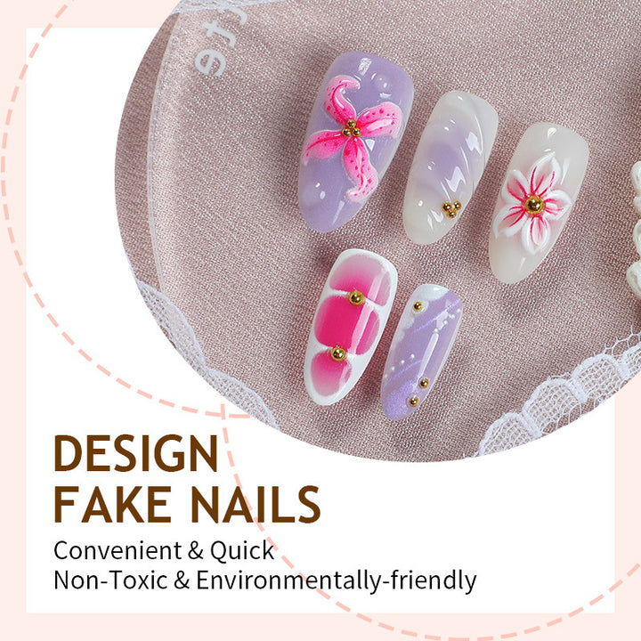Artificial nail set with floral decorations and delicate glitter Stornfield
