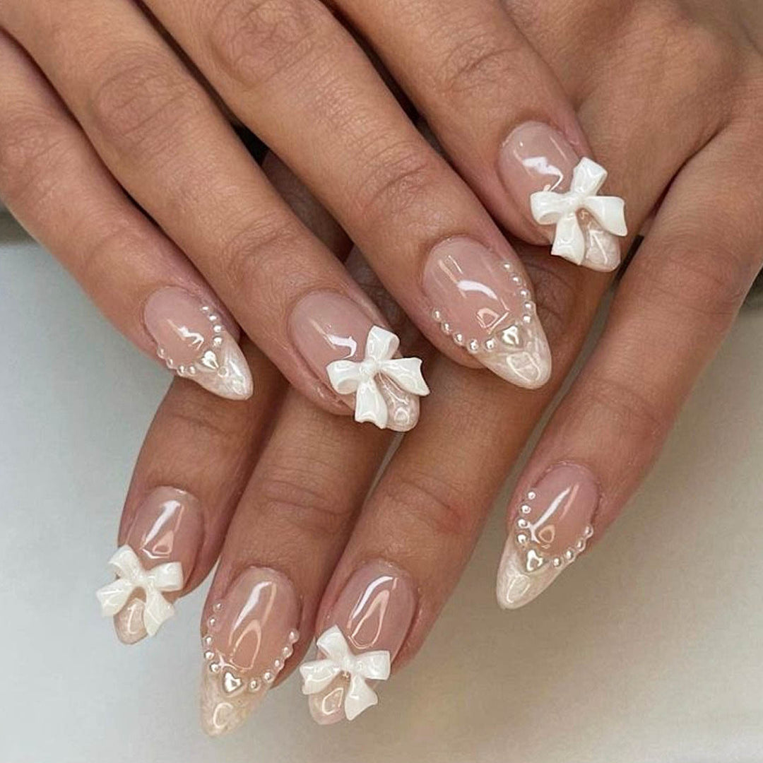 Artificial nail set with elegant bows and 3D decorations Stornfield