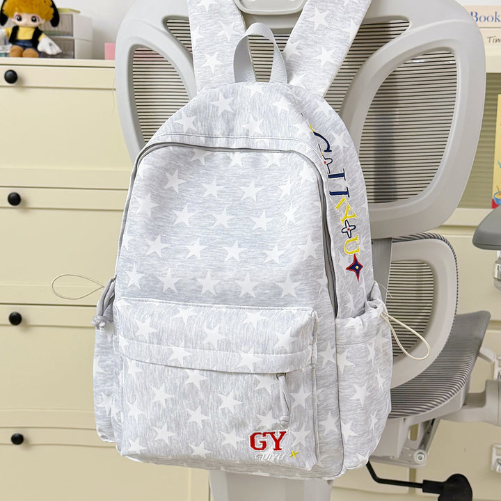 Versatile Multi-Pocket Star-Patterned Backpack Stornfield
