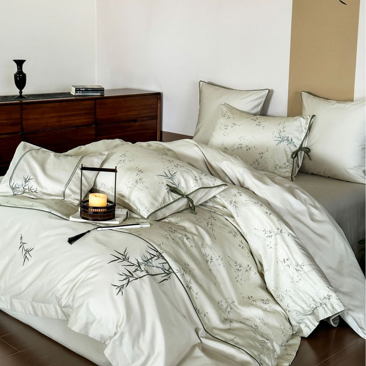 High-quality cotton satin bedding with subtle bamboo motif and piping