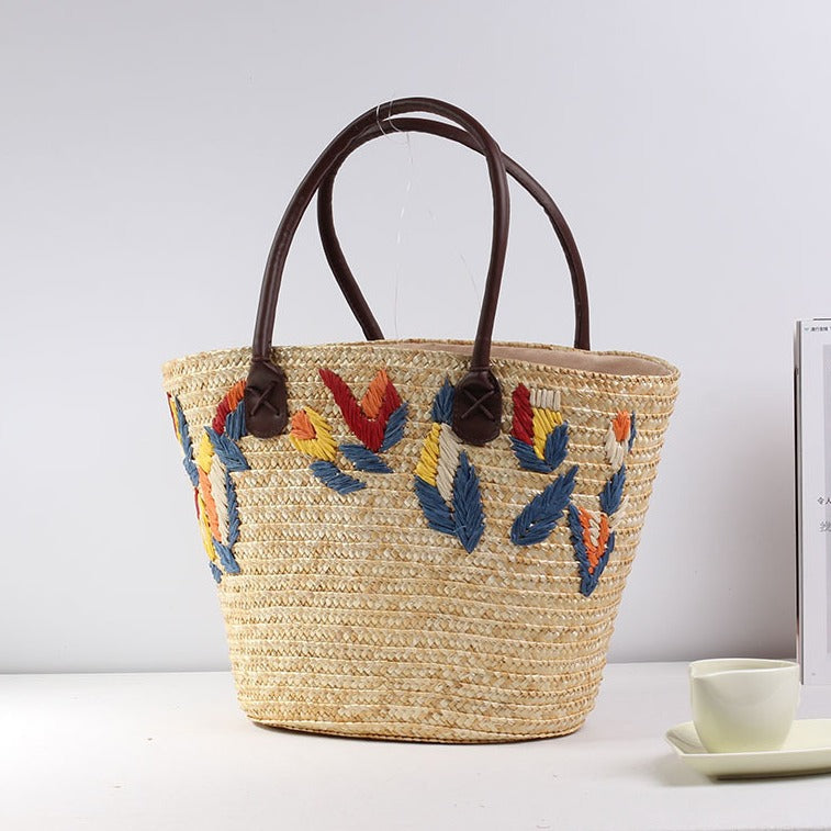 Braided beach bag with colorful embroidery pattern Stornfield