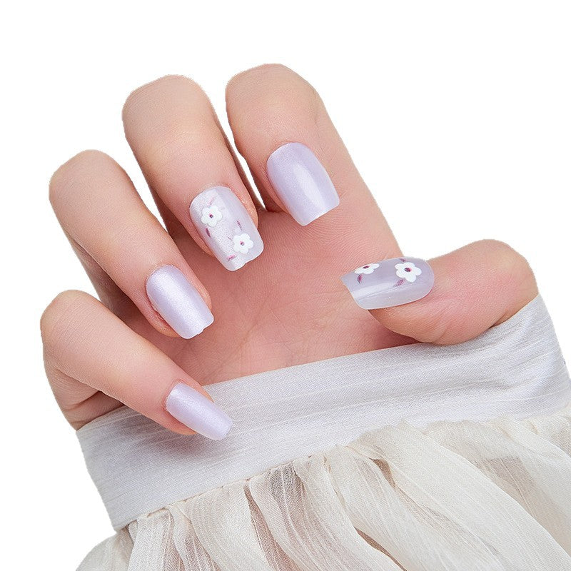 Artistic nail extensions with floral accents Stornfield