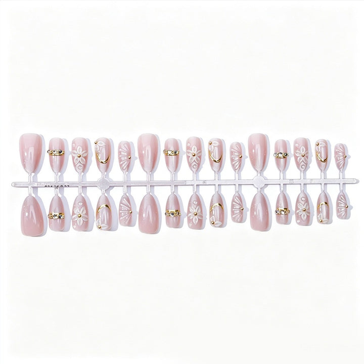 Elegant artificial nail set with floral and glitter elements Stornfield