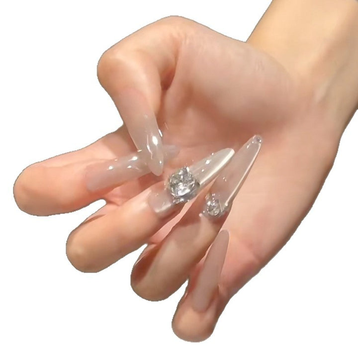 Artificial nail set with elegant tips and crystal accents Stornfield