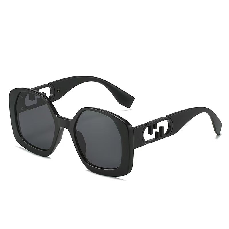 Women oversized sunglasses with extravagant geometric frame and elegant accents Stornfield