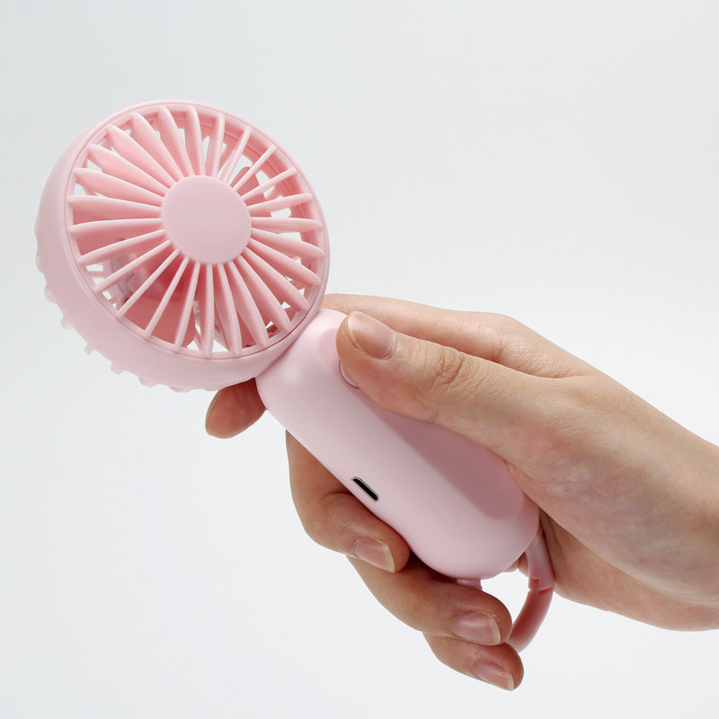 Unisex portable mini hand fan with USB charging and carrying strap Stornfield