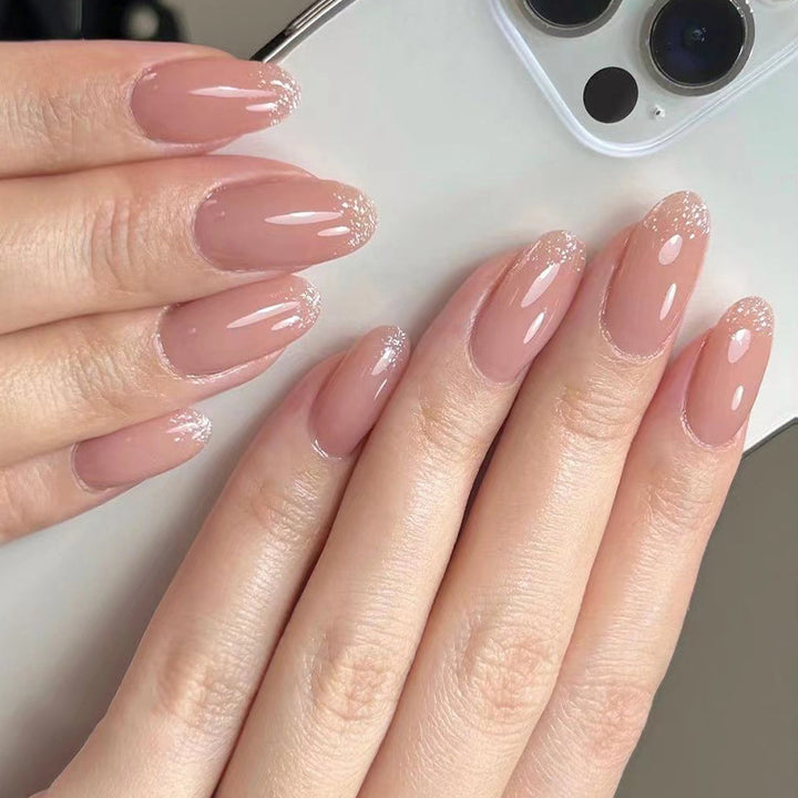 Artful nail polish applications with elegant glitter finish Stornfield