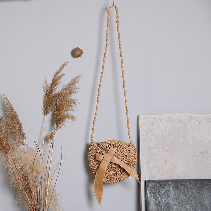 Handwoven shoulder bag with decorative bow accent Stornfield