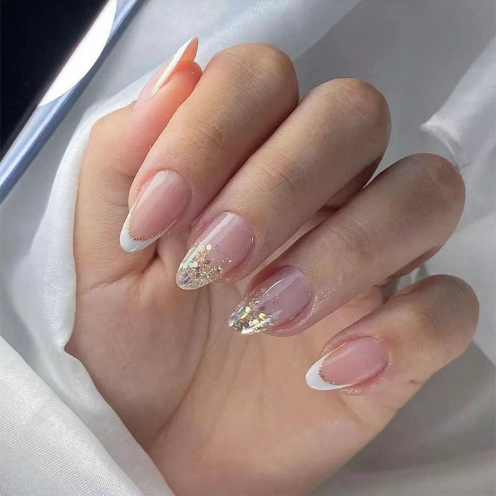 Elegant Stiletto Press-On Nail Set with Glitter and French Tip Stornfield