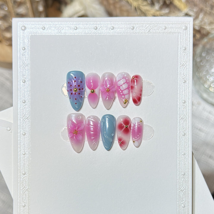 Artistic Press-On Nail Set with Floral and Abstract Designs Stornfield