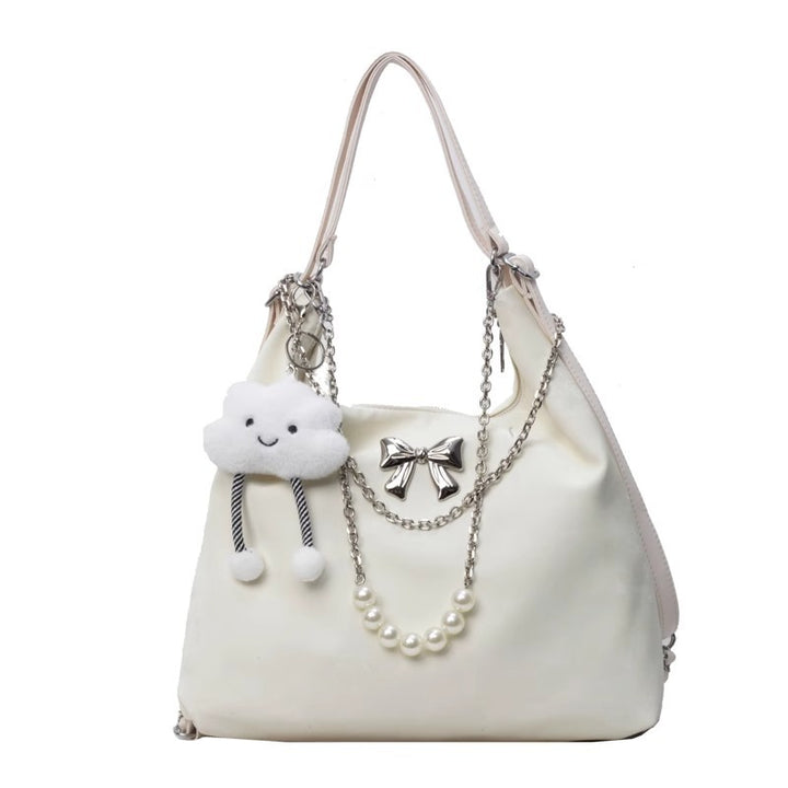 Fashionable handbag with unique pendant and chain accents Stornfield