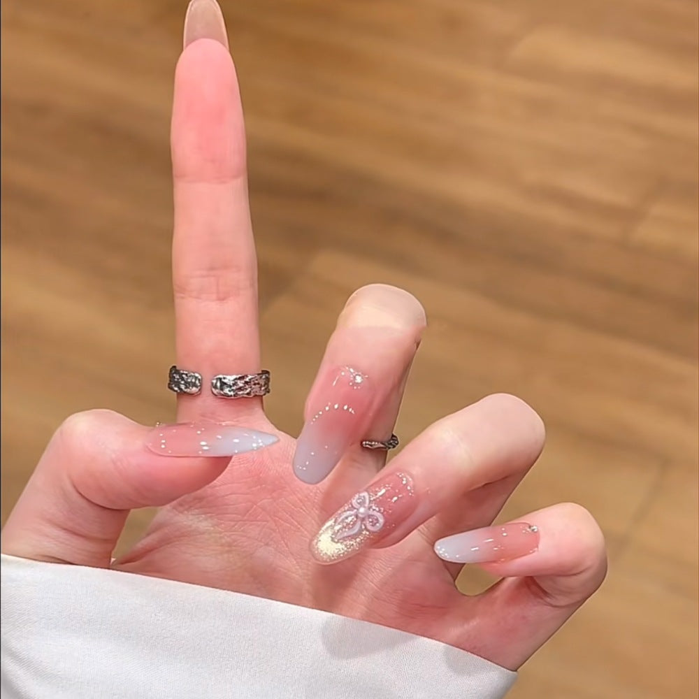 Artistic Press-On Nail Set with Floral and Glossy Accents Stornfield
