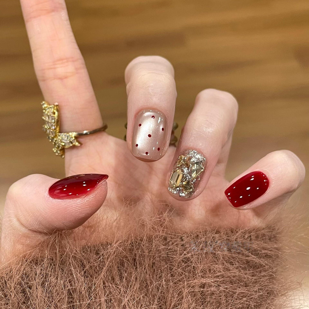 Glamorous artificial nails with sparkling rhinestones Stornfield