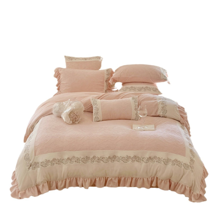 Quilted cotton duvet cover set with ruffle, embroidery border, and decorative quilted texture
