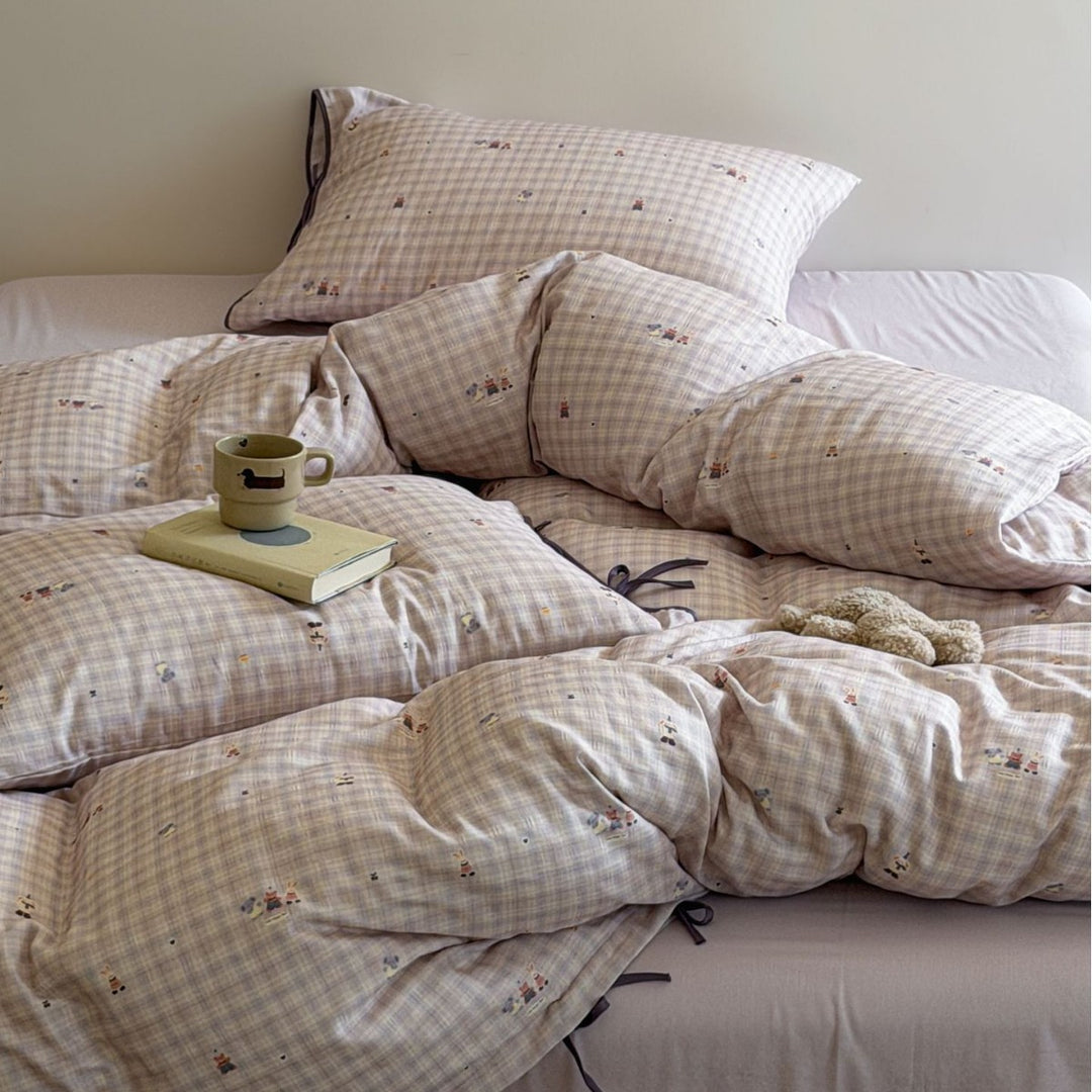 Cozy bedding set made of cotton percale with fine Vichy check and bow decoration