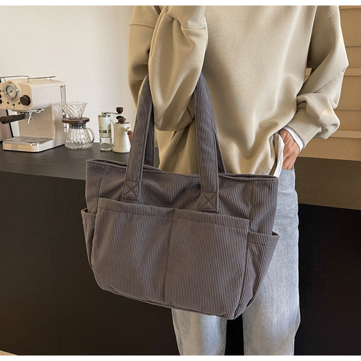 Multifunctional shoulder bag with large outer pockets Stornfield