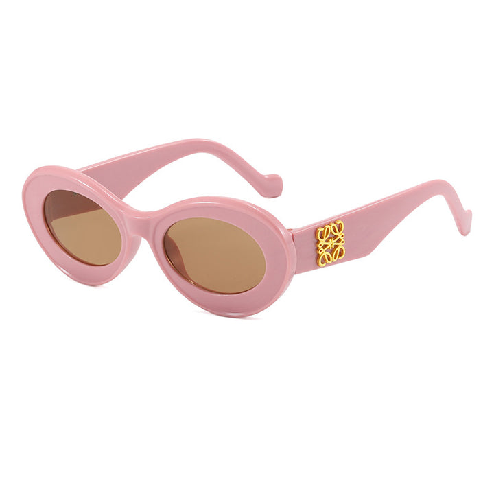 Women's fashionable sunglasses with oval frame and golden applications Stornfield