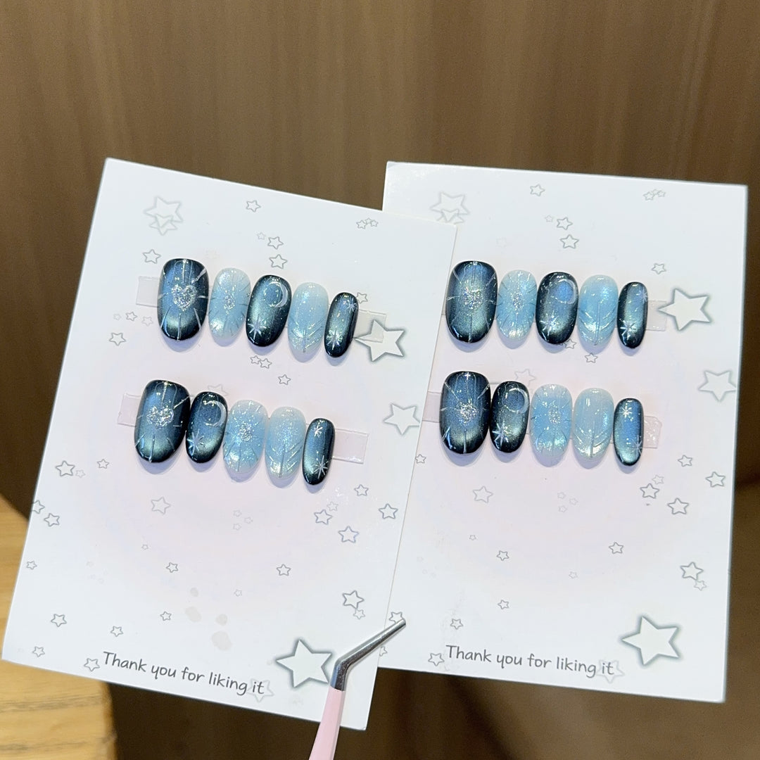 Glamorous artificial nail tips with star and glitter effects Stornfield