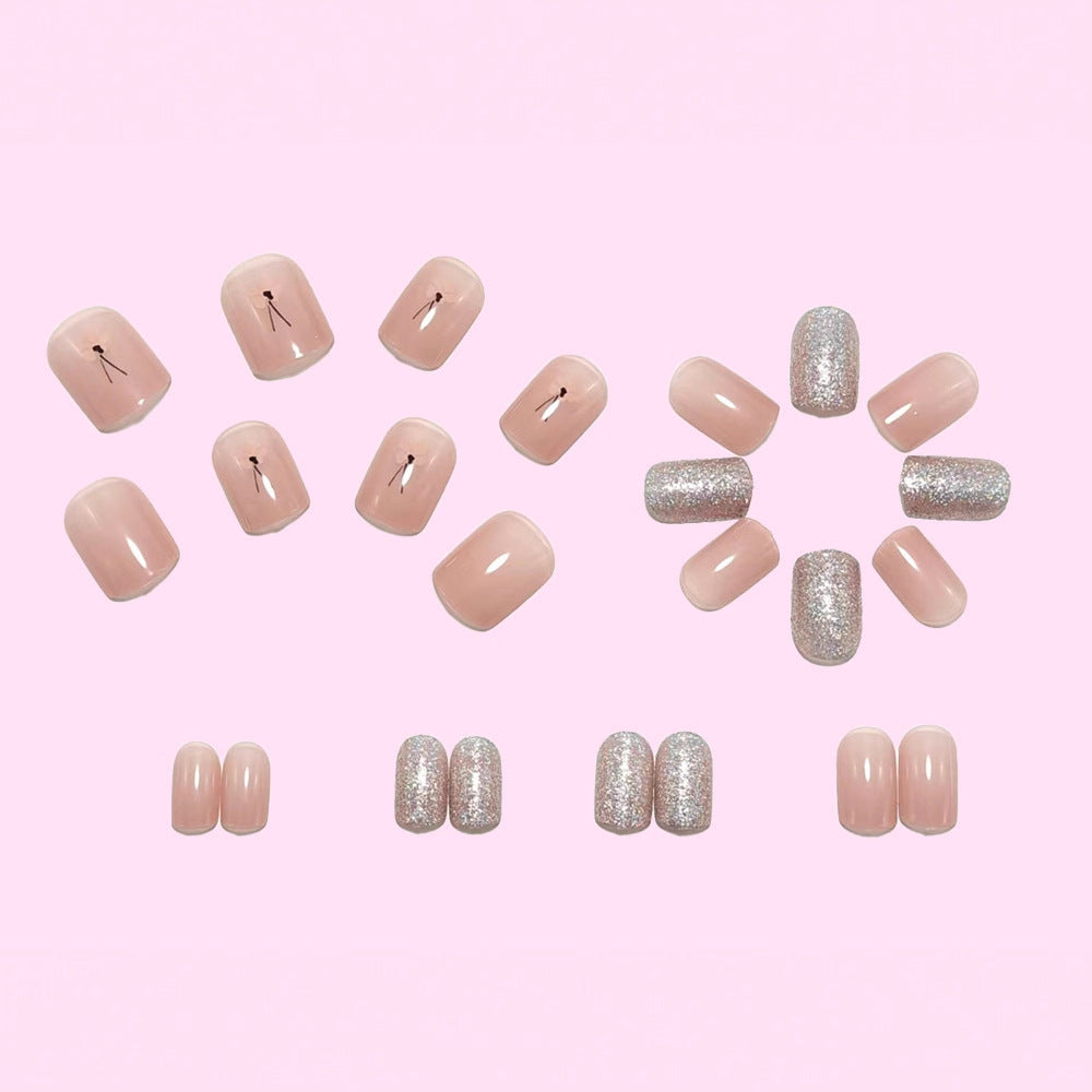 Artificial nails with sparkling accents and floral design Stornfield
