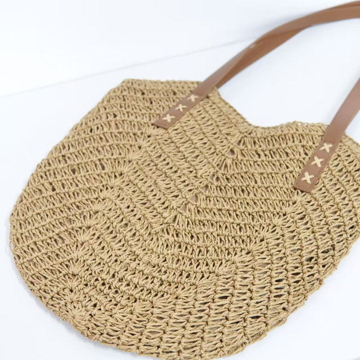 Beach bag with mesh structure and tassel details Stornfield