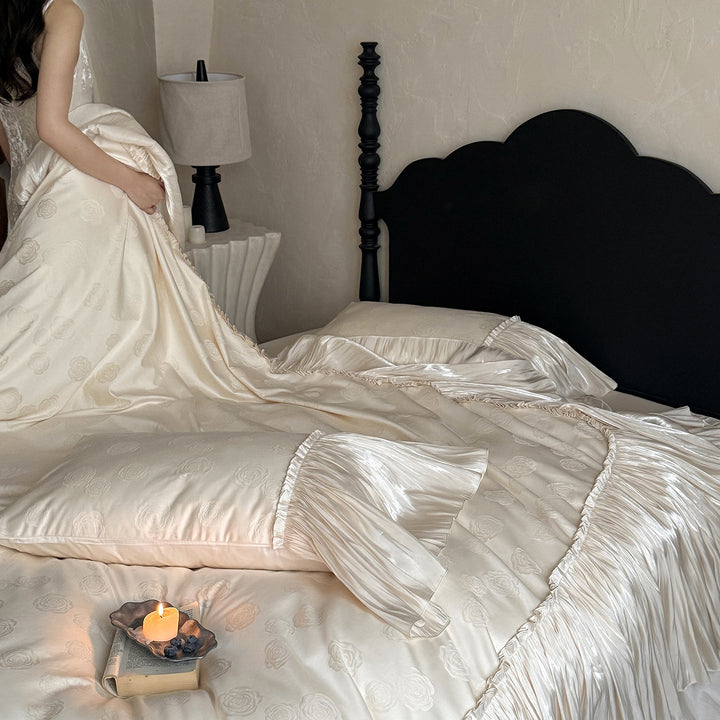 Luxurious satin bed linen set with ruffles and rose relief