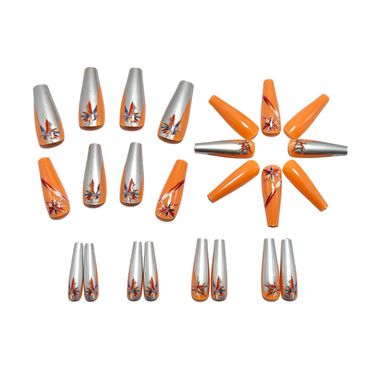Artificial nails with glamorous metallic and floral accents Stornfield