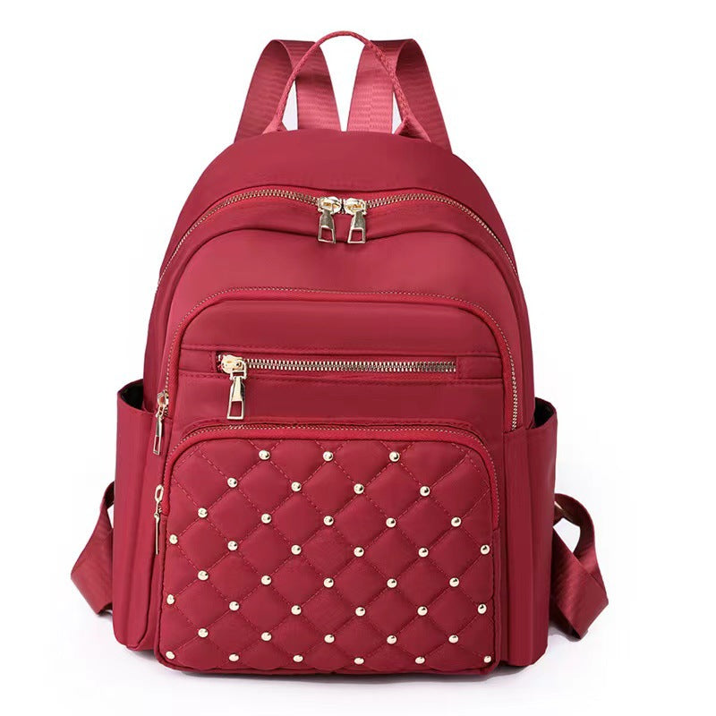 Quilted Backpack with Decorative Studs Stornfield