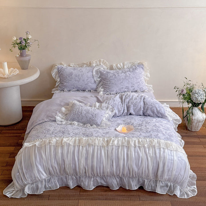 Ruffled satin bedding set with quilted floral relief