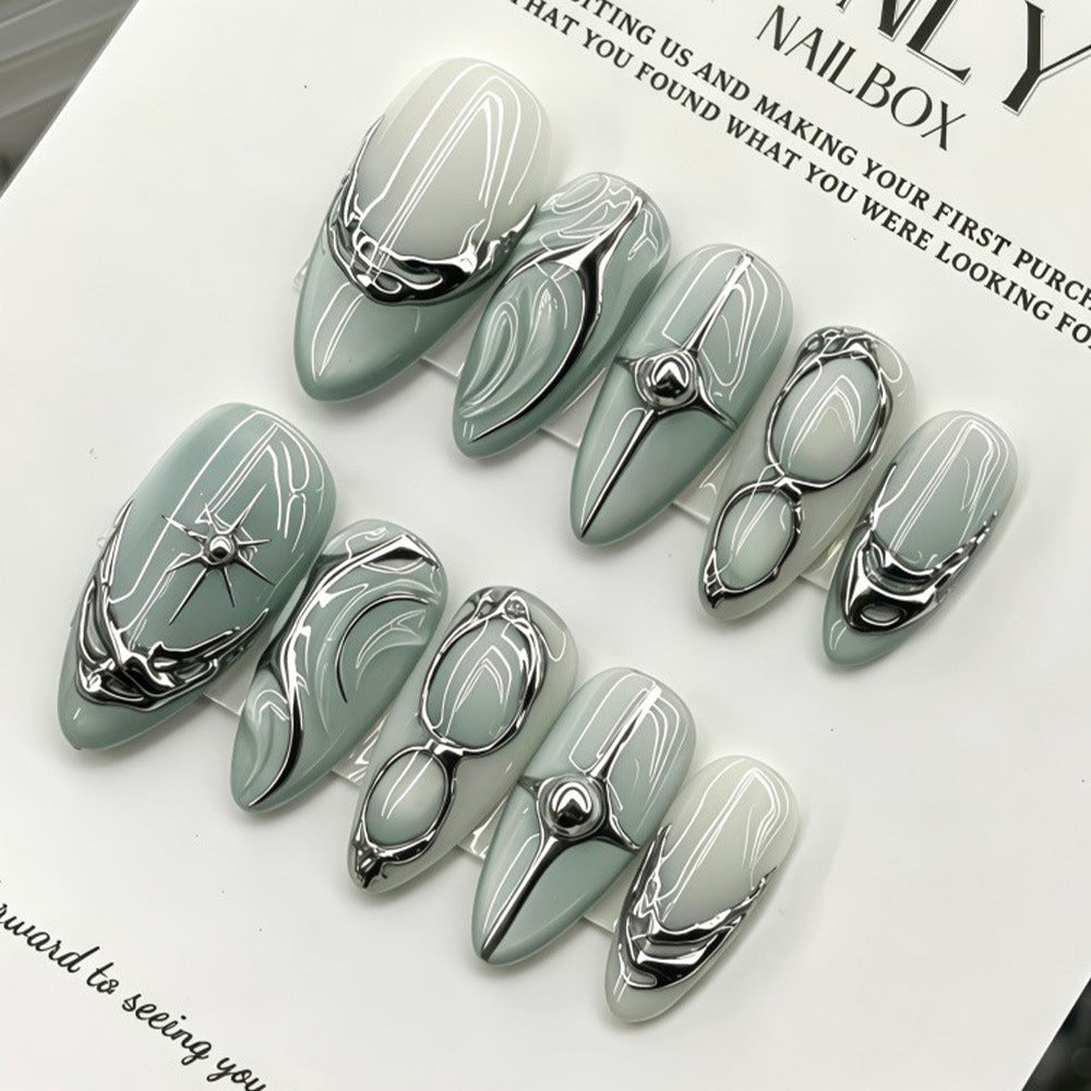 Elegant Artificial Nails with Artistic Accents Stornfield