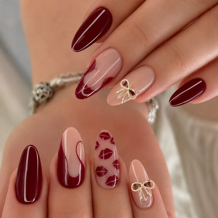 Acrylic nail set with elegant lip motifs and bow decorations Stornfield