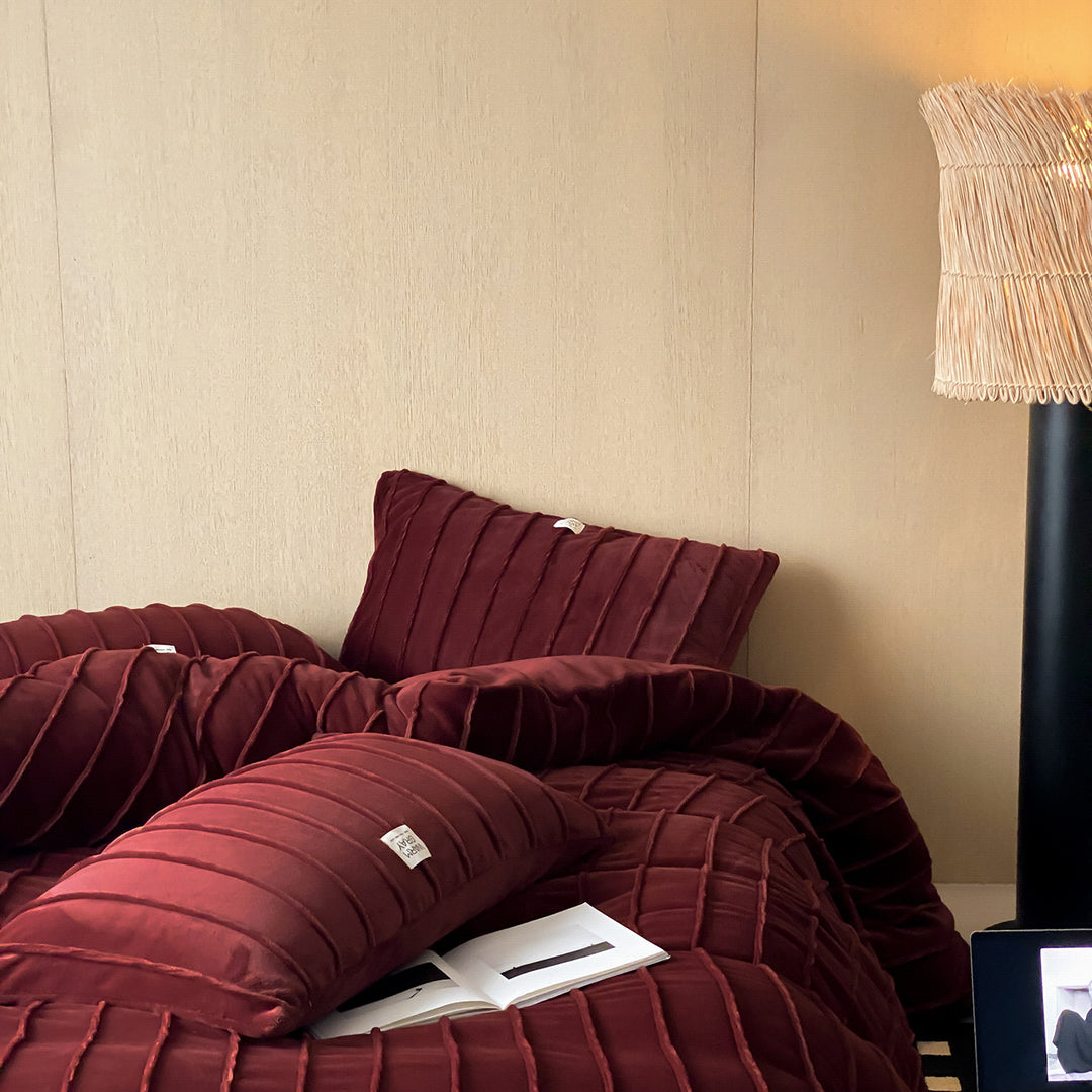 Bedding set with vertical textured piping and soft velvet look